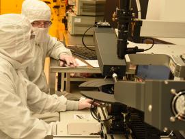 Two people working in the cleanroom